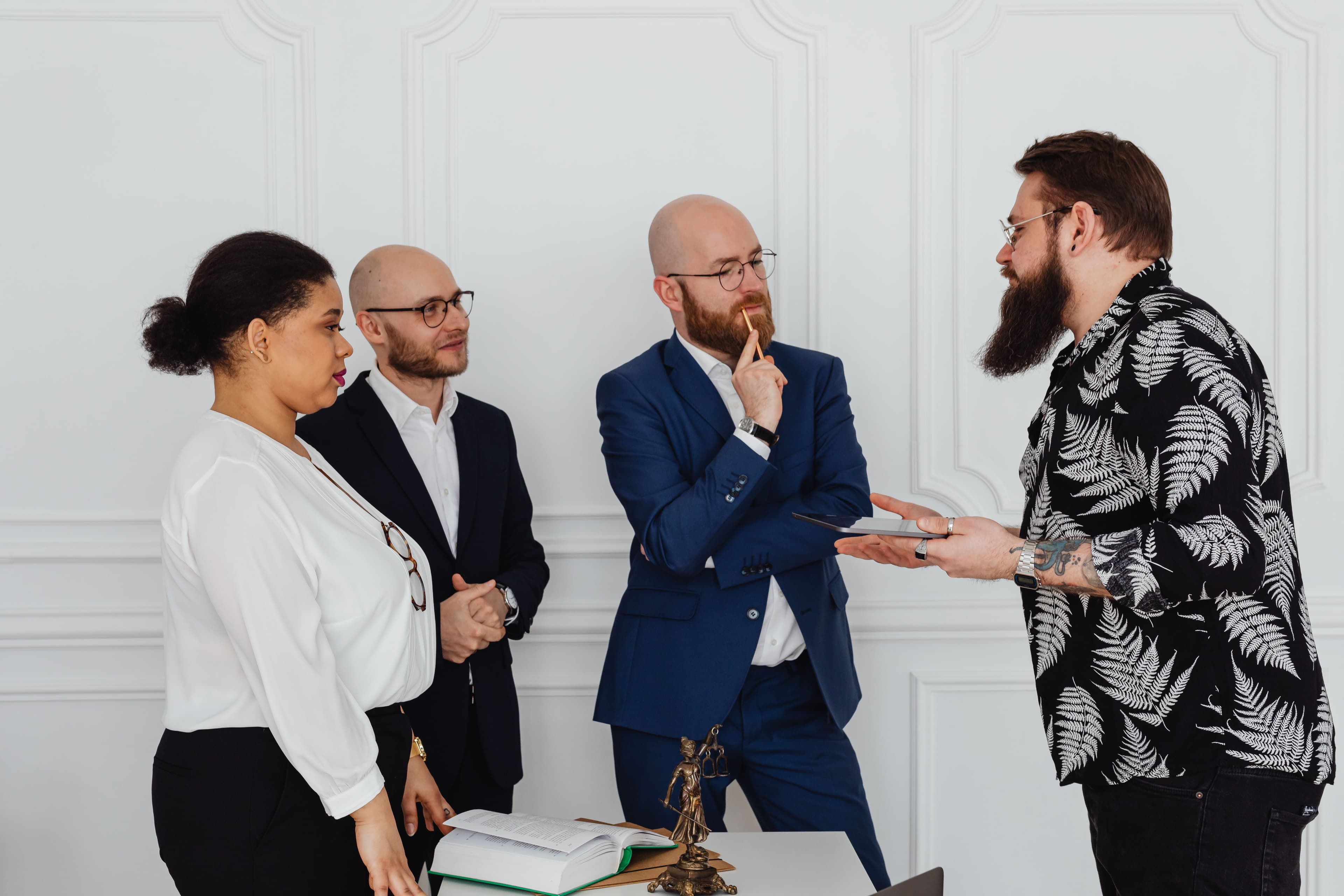 The Regainr team discussing a case together